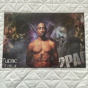 Posters, Tupac, Biggie, 50 Cent and Eminem.